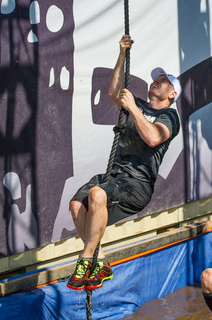 Joseph climbing rope