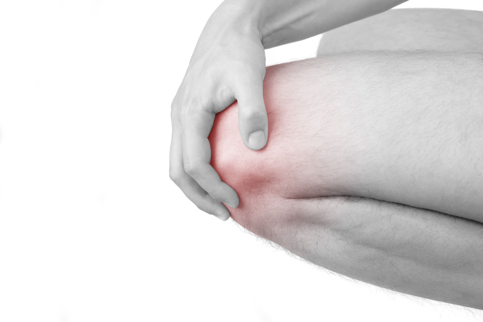Knee injury. Man holding his knee with highlighted pain are isolated on white background. Health and medicine.