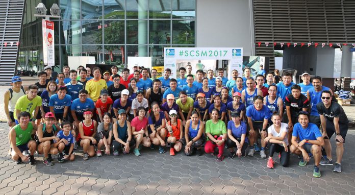 Joakim-Gomez-and-Denise-Keller-with-Run-Department,-the-pacers-and-other-participants