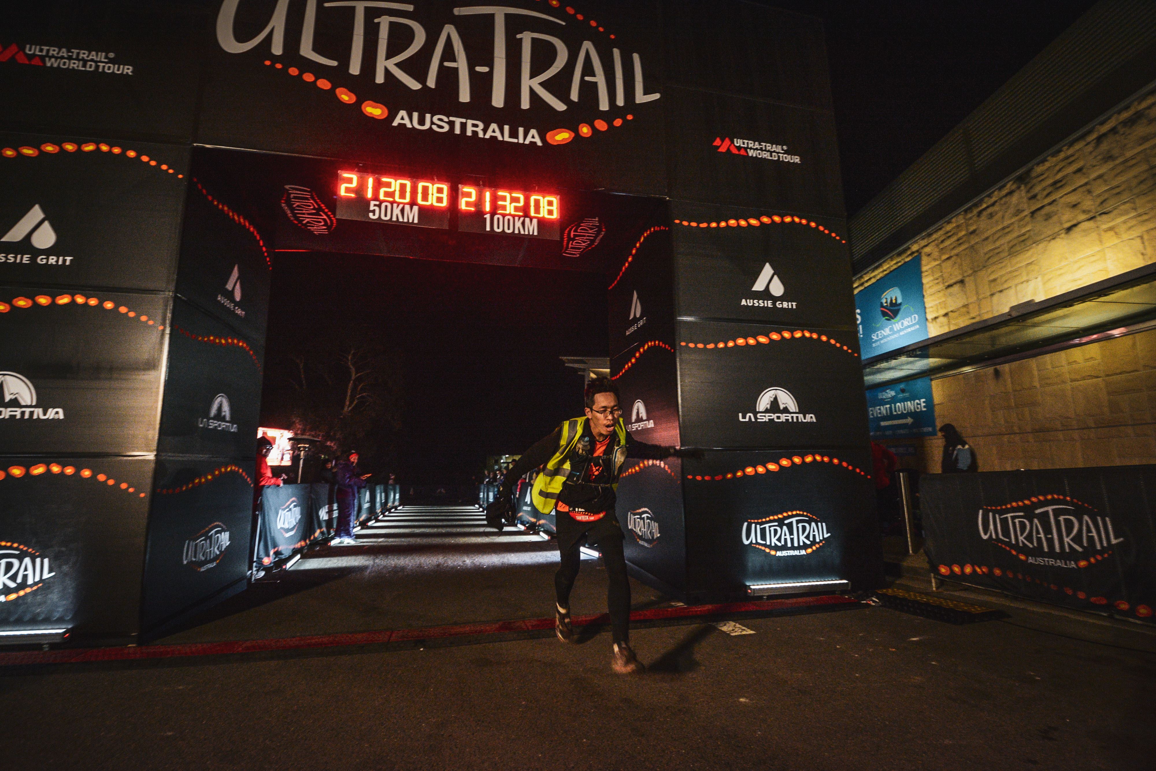 The author crosses the finishing line (100km) at Ultra-Trail Australia 2019. Image: Sportograft.